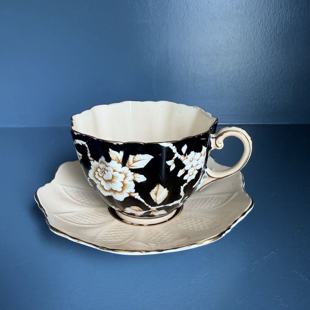 Antique Paragon Wild Rose Teacup and Saucer Bone China Black Ground Gilt 1930s